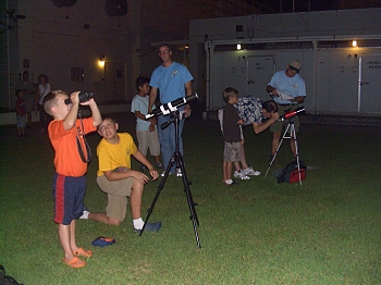 The young Cub Scouts observing the Moon with small telescopes. Click to enlarge.